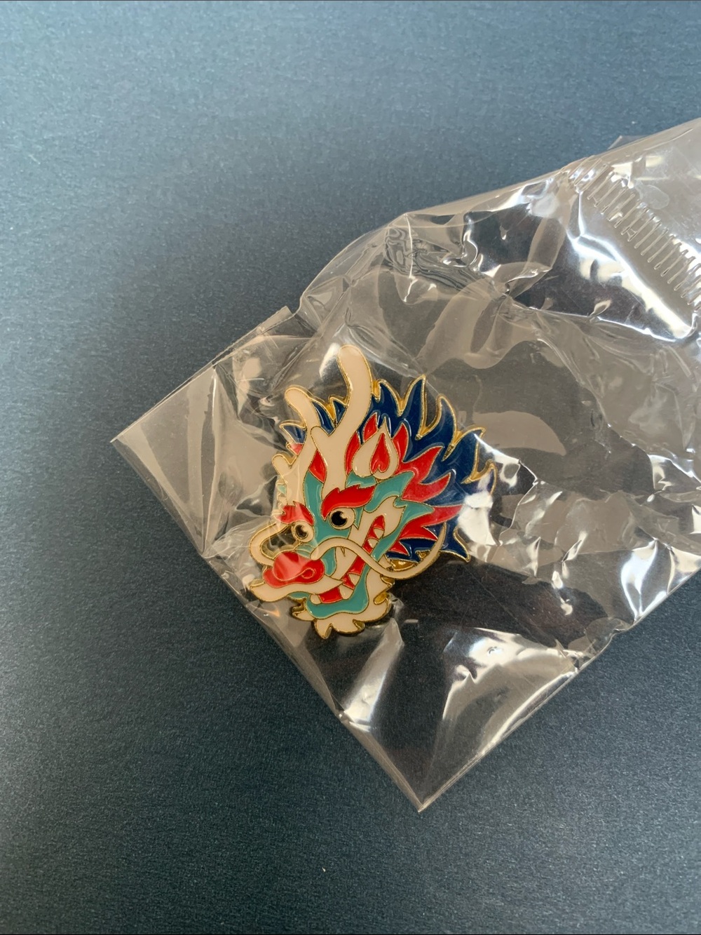 Elegant & Stylish Fire Dragon Enamel Pin - Sunburst Shape. Brand new. Size:1x1.5